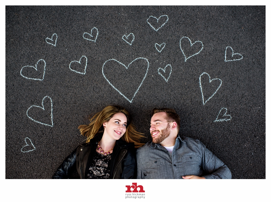 A couple surrounded by hearts in Philadelphia Engagement Session.